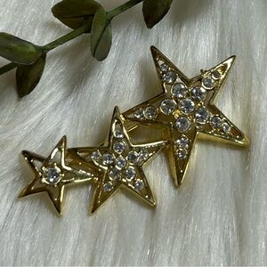 Star faceted rhinestones gold tone brooch